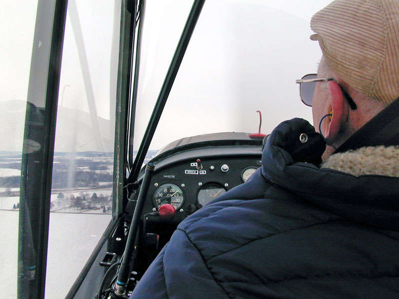 Buzz piloting the Champ during the 2005 ski fly-in.
