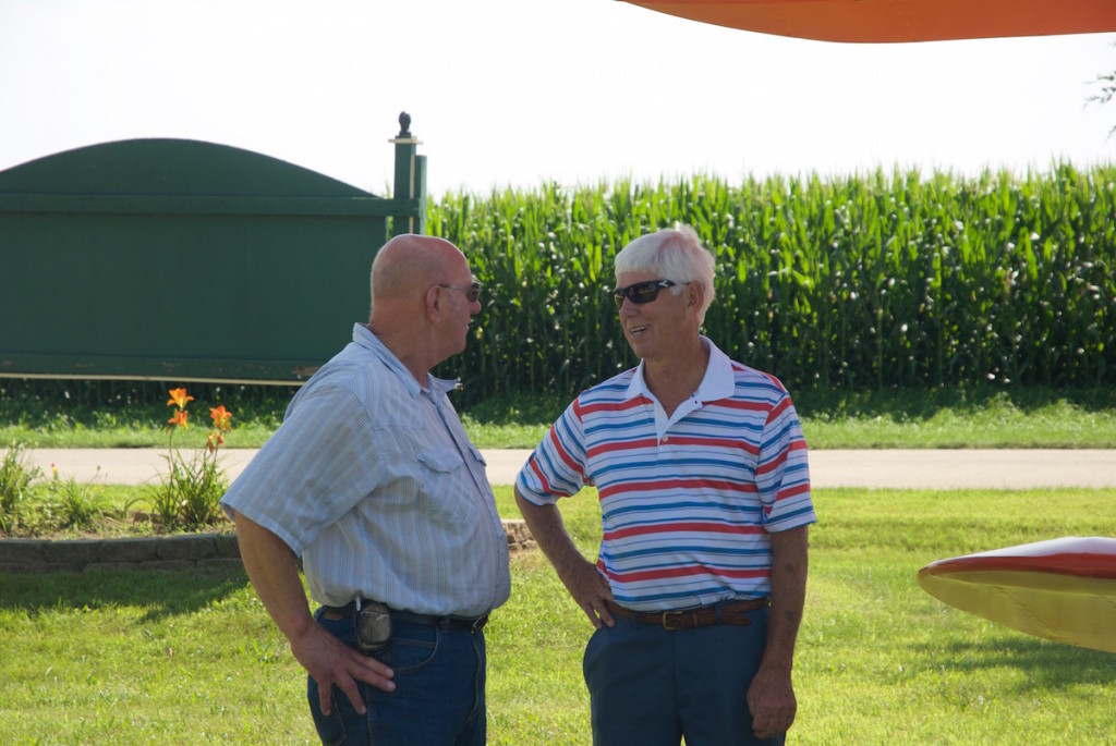 Jim Green and Gary Saunders chat before the ceremony. Jim's uncle Bob Green was an early airport pioneer and flew his Waco UPF-7 and Taylorcraft at the airport for many years. 