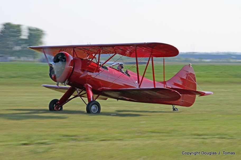 A Waco UPF-7 is an early arrival.