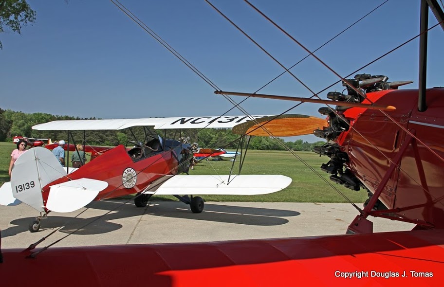 A very rare 1932 Franklin Sport biplane (back) and a 1928 Stearman C3B on display at the temporary home of the Kelch Aviation Museum at Brodhead Airport.